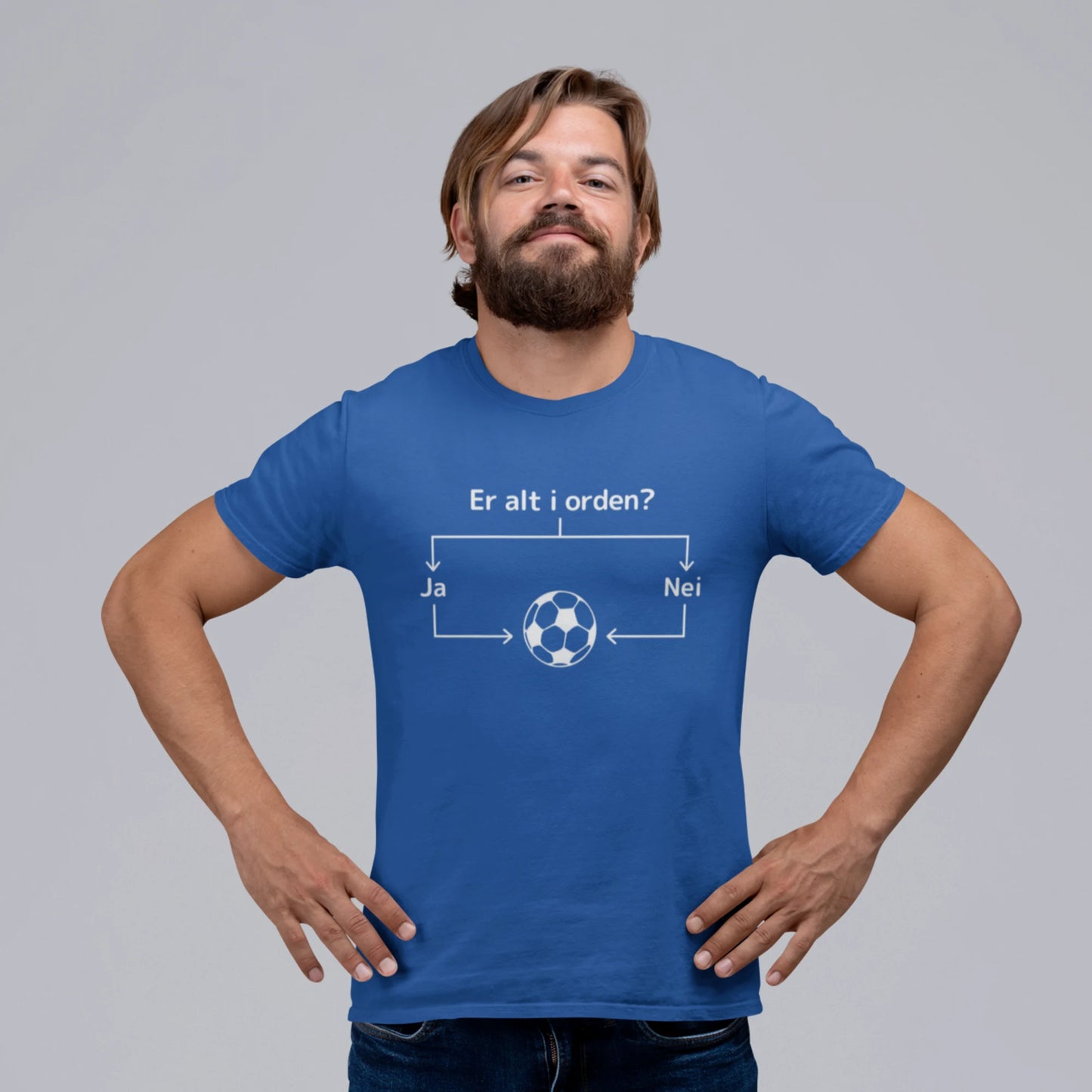 Royal blå T-skjorte med hvitt diagram og teksten "Er alt i orden?" som leder til en fotball.